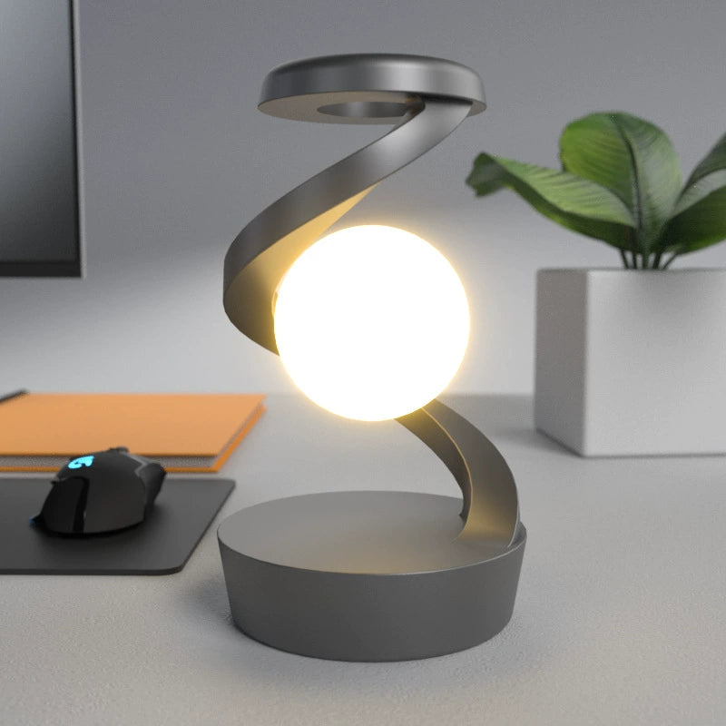 Floating Rotating LED Lamp with Wireless Charging – Modern Table Light